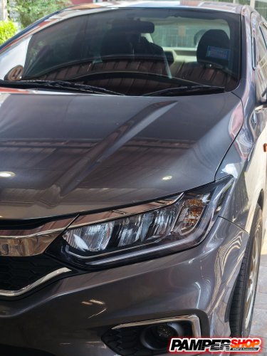 Honda City หุ้มฟิล์มไฟหน้า ( เกรด TPH ) สีฟ้าอ่อน Hybrid